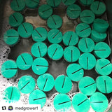 PermaClone™ 48mm Cloning Collars are being sanitized, illustrating the gap that allows chemical access.